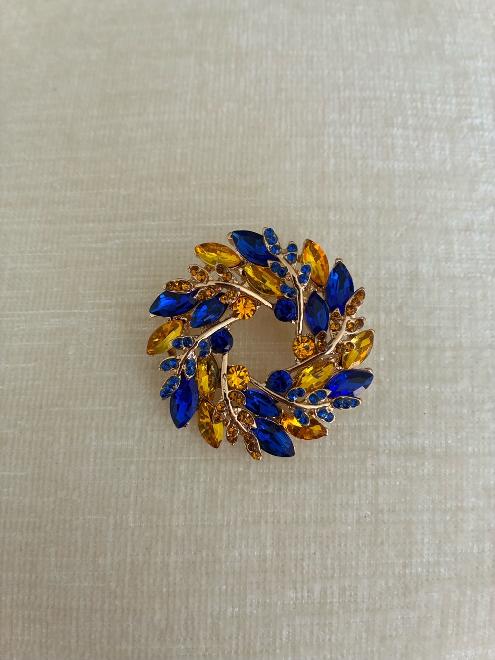Elegant Blue and Amber Crystal Wreath Brooch - Women's Jewelry